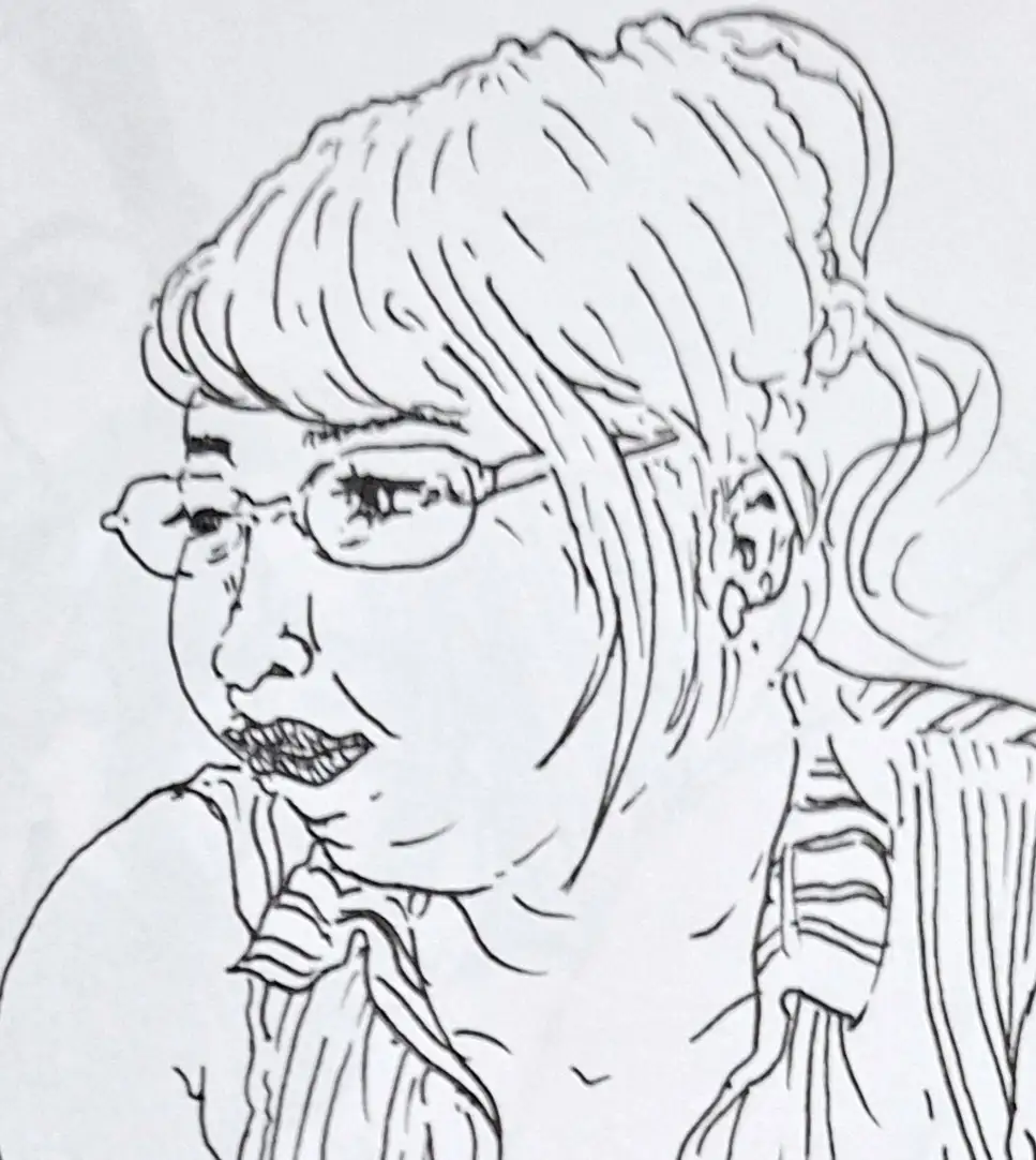 眼鏡をかけた女教師